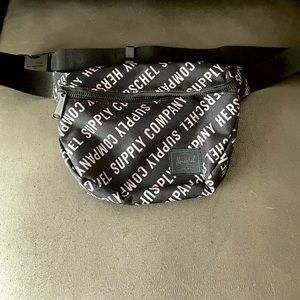 Excellent condition Herschel Hip Pack, black with branded wording